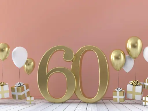 Złota liczba 60, balony i prezenty. Idealne życzenia na 60 urodziny!